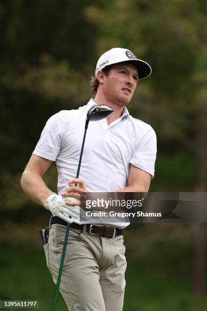 Drew Nesbitt of Canada plays watches shot from the tenth tee during the first round of the Wells Fargo Championship at TPC Potomac Clubhouse on May...