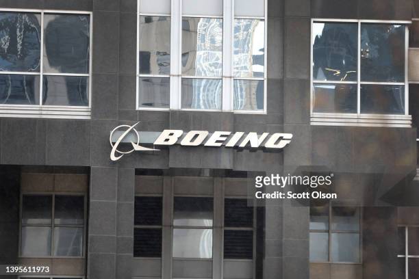 The Boeing Company logo hangs outside of the company's headquarters on May 05, 2022 in Chicago, Illinois. The Boeing Company said it would be moving...