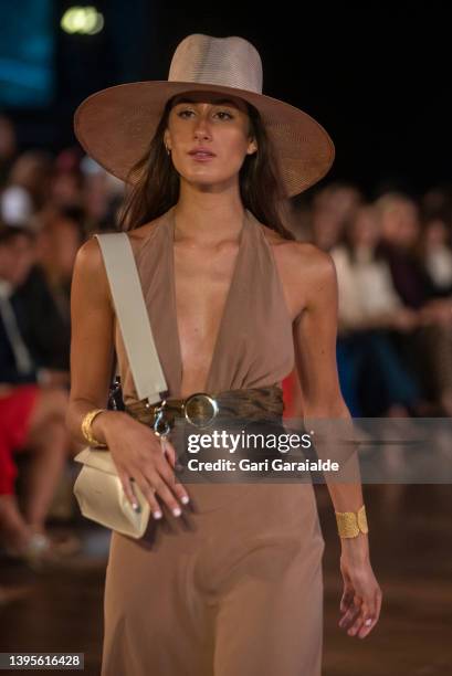 Model walks the runway at the Es Fascinante 'Raíces' fashion show during San Sebastian Moda Festival Spring-Summer 2022 at the Balenciaga Museum on...