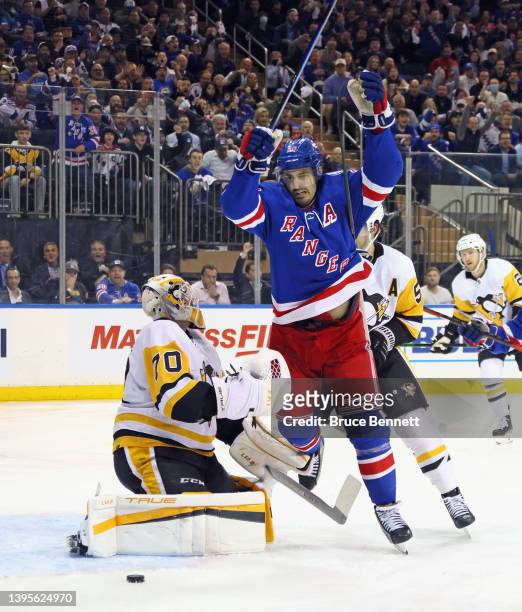 Chris Kreider of the New York Rangers celebrates a powerplay goal by Ryan Strome against Louis Domingue of the Pittsburgh Penguins at 2:59 of the...
