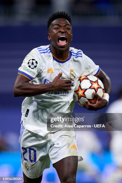 Vinicius Junior of Real Madrid celebrates after their side's second goal scored by Rodrygo of Real Madrid during the UEFA Champions League Semi Final...