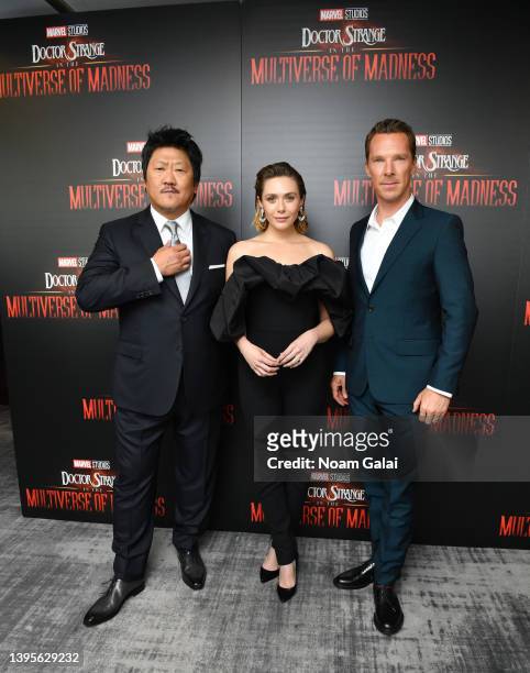 Benedict Wong, Elizabeth Olsen and Benedict Cumberbatch attend the NY special screening of Doctor Strange in the Multiverse of Madness on May 05,...