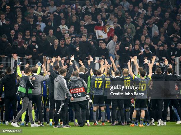 Players of Feyenoord Rotterdam celebrate the qualification for the Final with their supporters following the UEFA Europa Conference League Semi Final...