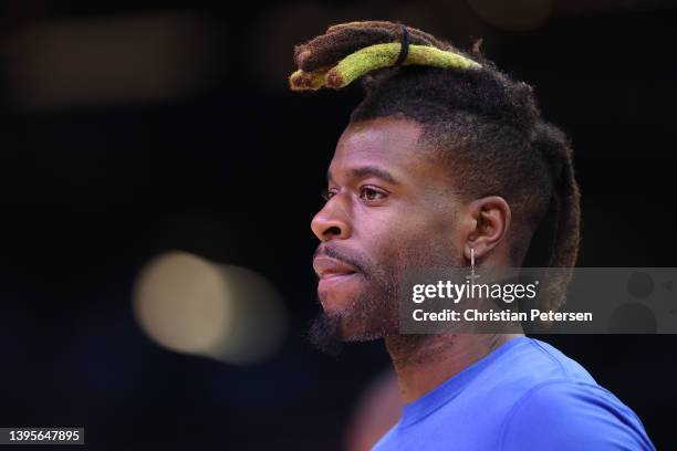 Reggie Bullock of the Dallas Mavericks warms up before Game Two of the Western Conference Second Round NBA Playoffs at Footprint Center on May 04,...