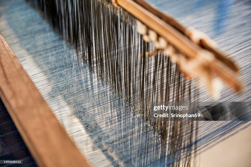 Traditional silk weaving Can be seen in the countryside of Thailand. selective focus