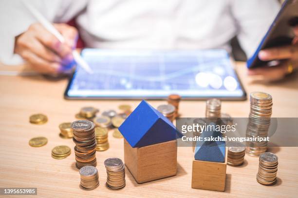 directly above shot of real estate broker work desk - estate agency stock-fotos und bilder