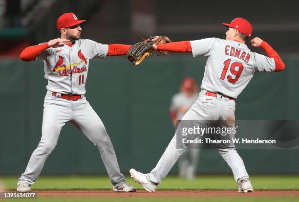 Paul DeJong and Tommy Edman of the St. Louis Cardinals celebrate defeating the San Francisco Giants 7-1 at Oracle Park on May 05, 2022 in San...