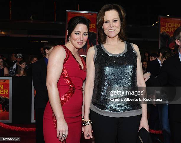 Actresses Lynn Collins and Sigourney Weaver arrive at the Walt Disney Presents "John Carter" premiere held at Regal Cinemas L.A. Live on February 22,...