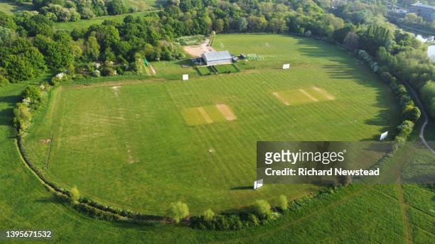 cricket field - playing cricket stock-fotos und bilder