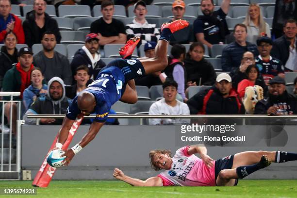 Mark Telea of the Blues scores a try during the round 12 Super Rugby Pacific match between the Blues and the Melbourne Rebels at Eden Park on May 06,...