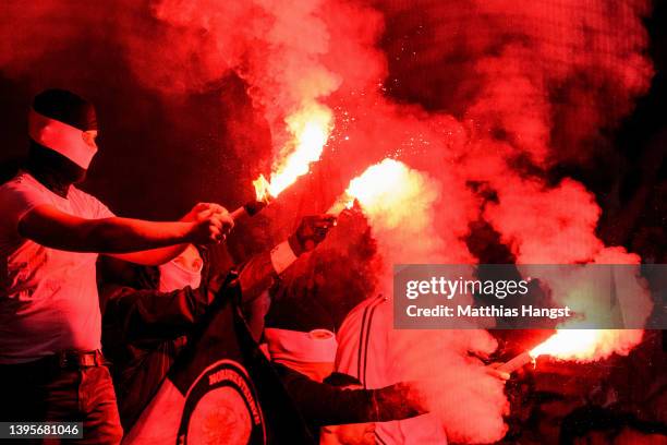 Fans of Eintracht Frankfurt let off flares after the UEFA Europa League Semi Final Leg Two match between Eintracht Frankfurt and West Ham United at...