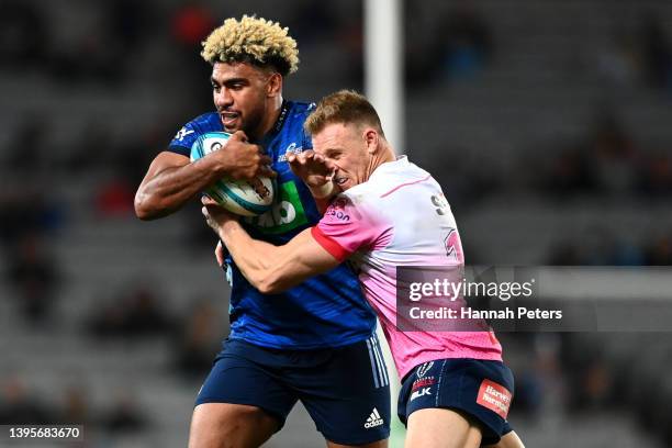 Hoskins Sotutu of the Blues charges forward during the round 12 Super Rugby Pacific match between the Blues and the Melbourne Rebels at Eden Park on...