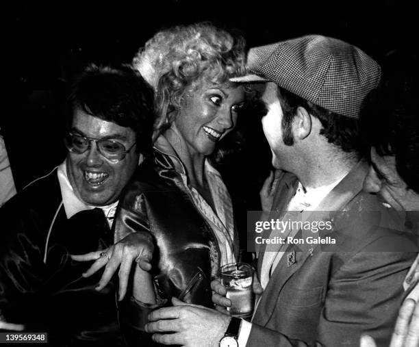 Producer Allan Carr, actress Olivia Newton-John and musician Elton John attend the premiere party for "Grease" on June 13, 1978 at Sudio 54 in New...