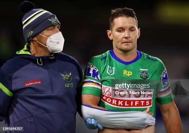 Jarrod Croker of the Raiders is taken from the field with an injury during the round nine NRL match between the Canberra Raiders and the Canterbury...