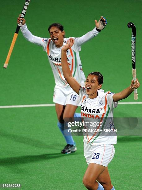 Rani Rampal of India celebrates with teammate Vandana Katariya after scoring a goal during their women's field hockey match against Canada of the FIH...