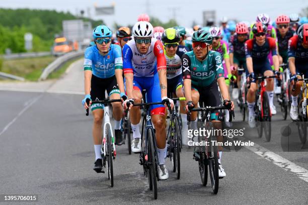 Jacopo Guarnieri of Italy and Team Groupama - FDJ and Cesare Benedetti of Poland and Team Bora - Hansgrohe compete during the 105th Giro d'Italia...