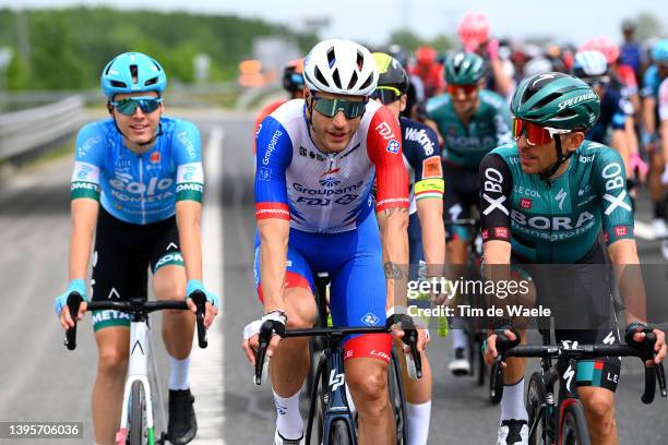 Jacopo Guarnieri of Italy and Team Groupama - FDJ and Cesare Benedetti of Poland and Team Bora - Hansgrohe compete during the 105th Giro d'Italia...