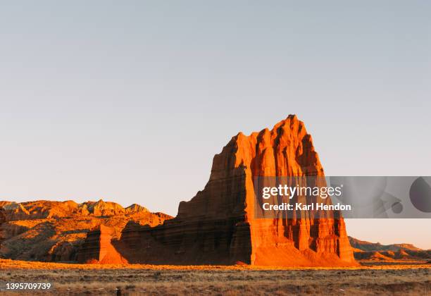 temple of the sun at sunrise - capitol reef national park fotografías e imágenes de stock