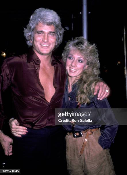 Actor Michael Landon and girlfriend Cindy Clerico on November 21, 1982 pose for photographs outside the Sherry Netherlands Hotel in New York City.