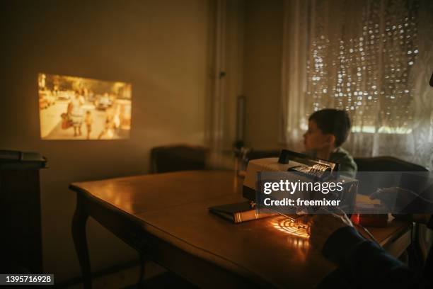looking at old pictures - slide projector stock pictures, royalty-free photos & images