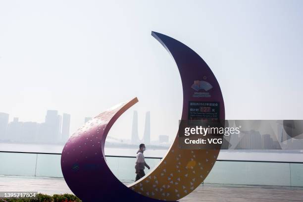 Pedestrian walks by a countdown clock for the 19th Asian Games Hangzhou 2022 on May 6, 2022 in Hangzhou, Zhejiang Province of China.