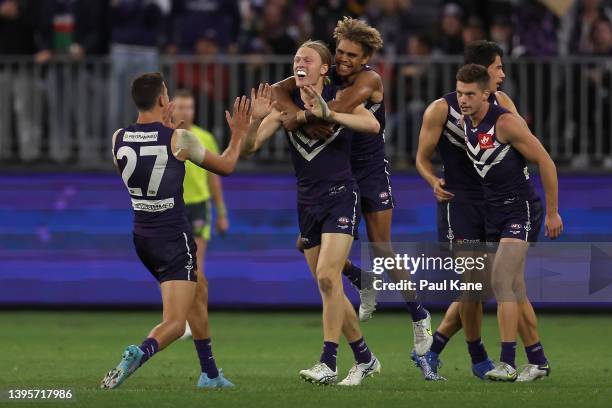 Hayden Young of the Dockers celebrates a goal during the round eight AFL match between the Fremantle Dockers and the North Melbourne Kangaroos at...