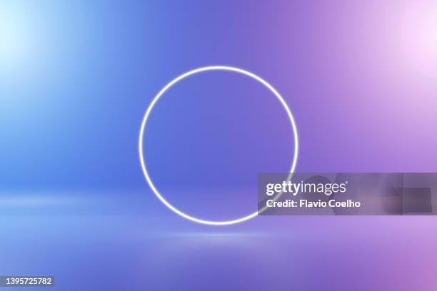 neon circle on blue and purple background - neon stock-fotos und bilder