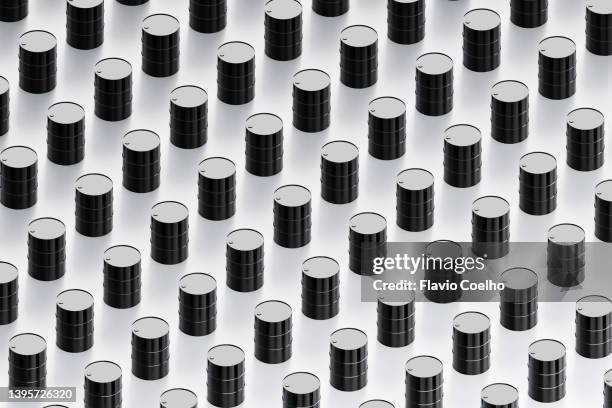 crude oil drums pattern background - oil drum stock pictures, royalty-free photos & images