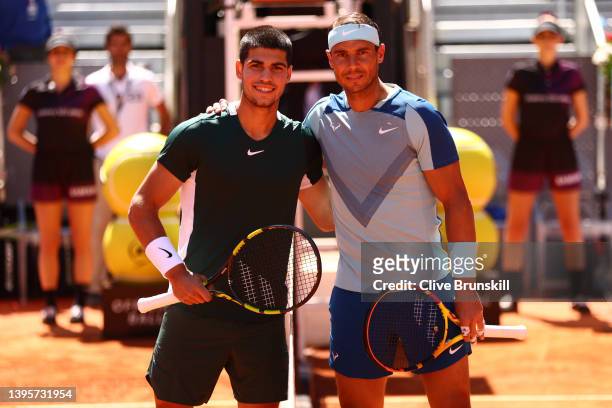 Carlos Alcaraz Garfia of Spain and Rafael Nadal of Spain pose for a photo ahead of their quarter-final match during day nine of Mutua Madrid Open at...