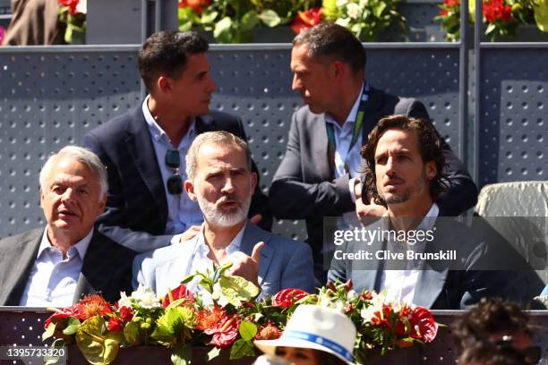 King Felipe VI of Spain speaks with Feliciano Lopez , Mutua Madrid Open Tournament Director in the quarter-final match between Rafael Nadal of Spain...