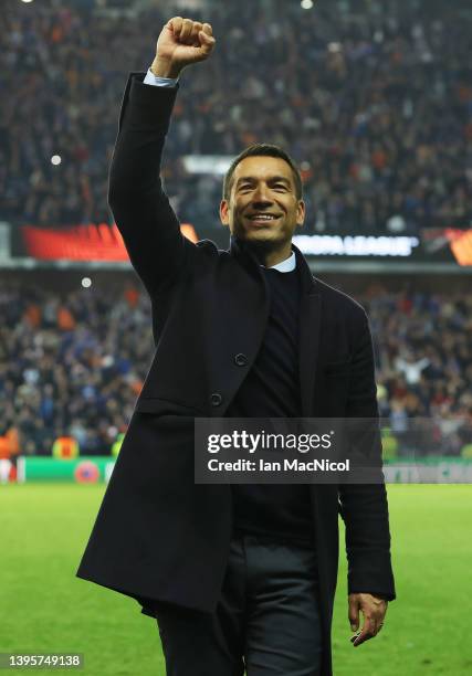 Giovanni van Bronckhorst, Manager of Rangers celebrates after victory in the UEFA Europa League Semi Final Leg Two match between Rangers and RB...