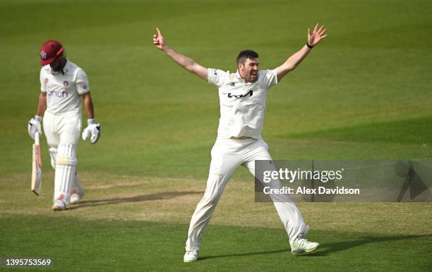 Jamie Overton of Surrey celebrates taking the wicket of Saif Zaib of Northamptonshire during Day Two of the LV= Insurance County Championship match...