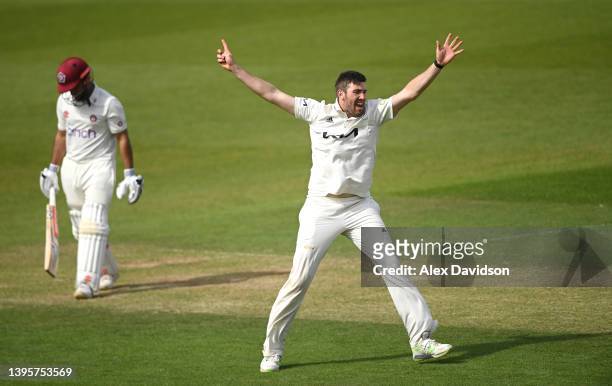 Jamie Overton of Surrey celebrates taking the wicket of Saif Zaib of Northamptonshire during Day Two of the LV= Insurance County Championship match...