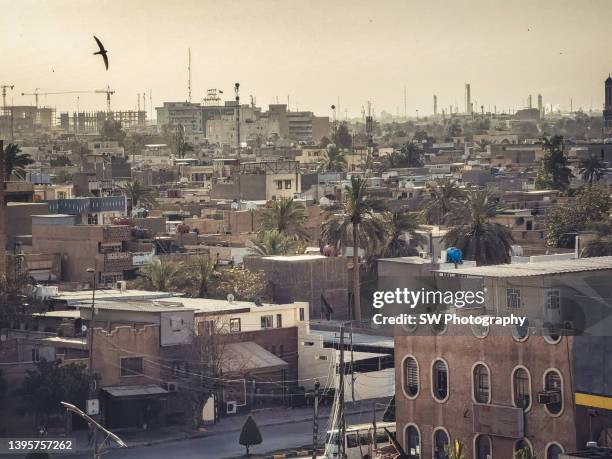 mobile device photo of the baghdad cityscape - baghdad aerial stock pictures, royalty-free photos & images