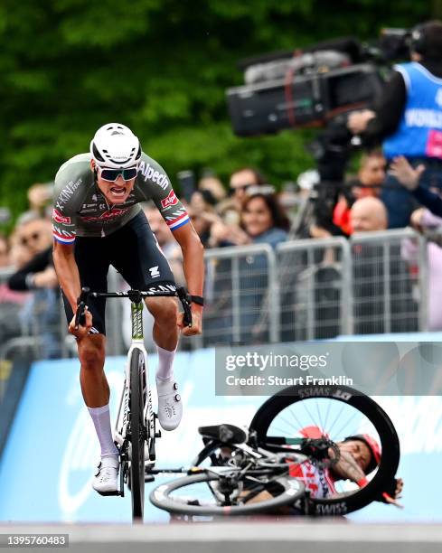 Mathieu Van Der Poel of Netherlands and Team Alpecin - Fenix and Caleb Ewan of Australia and Team Lotto Soudal sprint at finish line during the 105th...