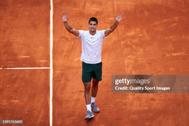 Carlos Alcaraz of Spain celebrates his win over Rafael Nadal of Spain during their Men's Singles match on day nine of the Mutua Madrid Open at La...