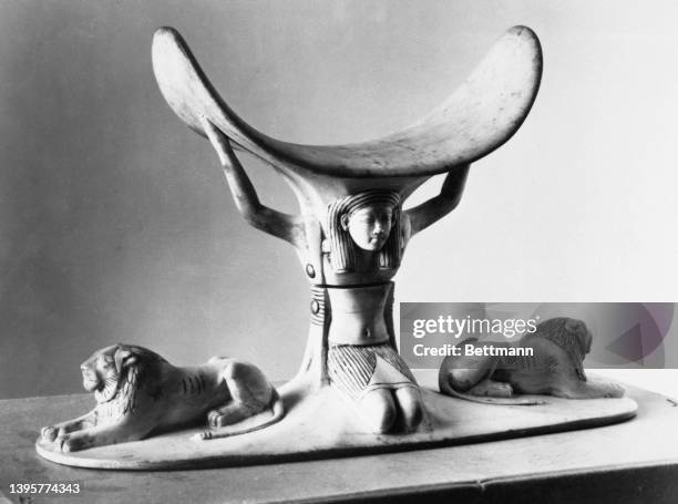 An ivory and wood headrest that is one of the 55 works on view recently in the "Treasures of Tutankhamen" at the National Gallery of Art in...