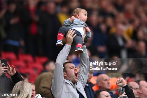Sunderland fan and child react as the teams enter the field during the Sky Bet League One Play-Off Semi Final 1st Leg match between Sunderland and...
