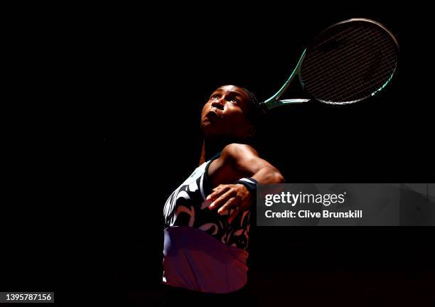 Coco Gauff of the United States serves with partner Jessica Pegula of the United States in their women's doubles semifinal match against Desirae...