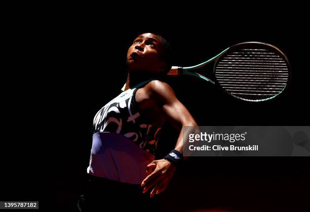 Coco Gauff of the United States serves with partner Jessica Pegula of the United States in their women's doubles semifinal match against Desirae...