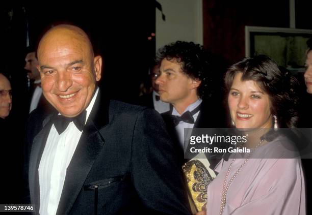 Actor Telly Savalas and date Julie Hovland attend the 12th Annual American Film Institute Lifetime Achievement Award Salute to Lillian Gish on March...