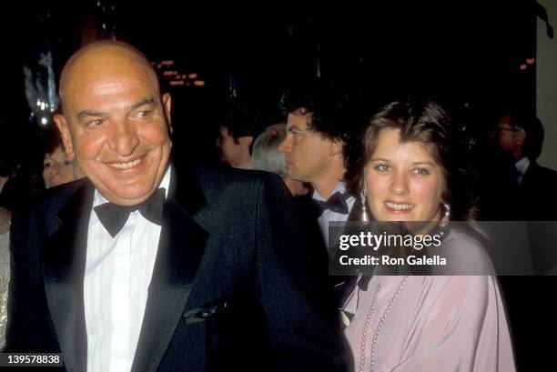 Actor Telly Savalas and date Julie Hovland attend the 12th Annual American Film Institute Lifetime Achievement Award Salute to Lillian Gish on March...