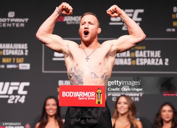 Justin Gaethje poses on the scale during the UFC 274 ceremonial weigh-in at the Arizona Federal Theatre on May 06, 2022 in Phoenix, Arizona.