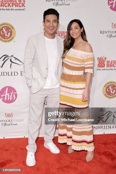 Mario Lopez and Courtney Laine Mazza attend the 9th Annual Unbridled Eve Kentucky Derby Gala at The Galt House Hotel on May 06, 2022 in Louisville,...