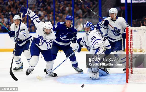 Jack Campbell of the Toronto Maple Leafs stops a shot from Ondrej Palat of the Tampa Bay Lightning in the second period during Game Three of the...