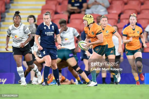 Shannon Parry of the Wallaroos runs with the ball during the Women's International Test match between the Australia Wallaroos and Fijiana at Suncorp...