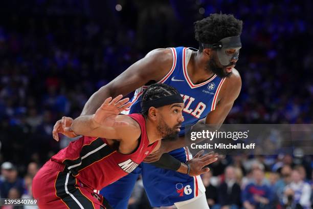 Gabe Vincent of the Miami Heat guards Joel Embiid of the Philadelphia 76ers during Game Three of the 2022 NBA Playoffs Eastern Conference Semifinals...