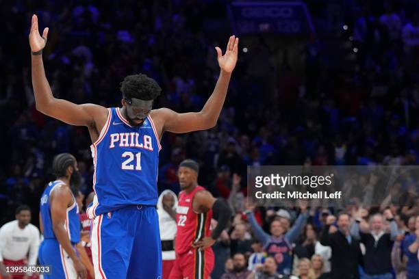 Joel Embiid of the Philadelphia 76ers reacts against the Miami Heat during Game Three of the 2022 NBA Playoffs Eastern Conference Semifinals at the...