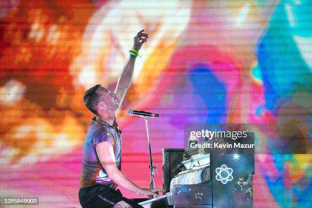 Chris Martin of Coldplay performs onstage during their "Music of the Spheres" tour at Cotton Bowl on May 06, 2022 in Dallas, Texas.