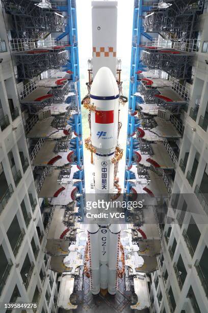 The combination of the Tianzhou-4 cargo spacecraft and a Long March-7 Y5 carrier rocket is being transferred to the launching area of the Wenchang...